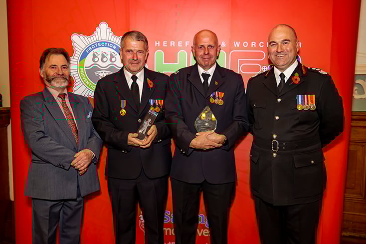 Firefighters receive long service medals at awards ceremony