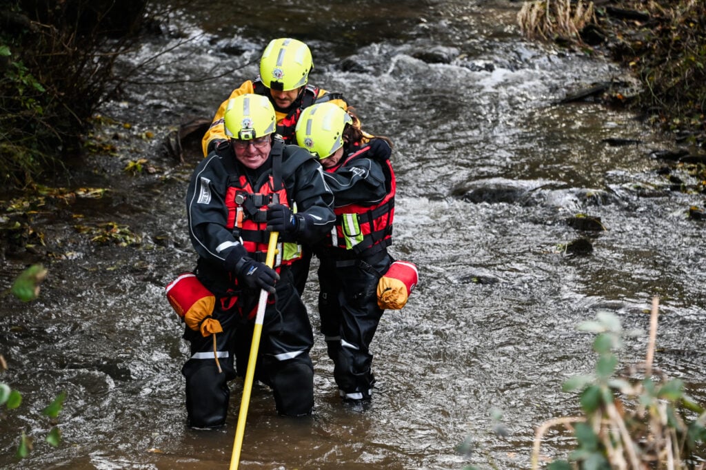 3 firefighter in water rescue exercise