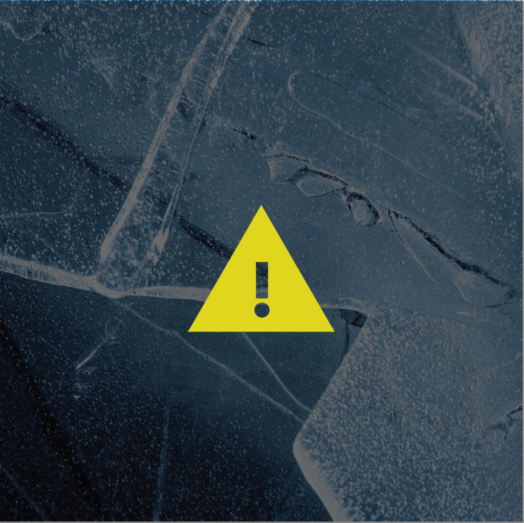 Yellow warning sign on the background of ice